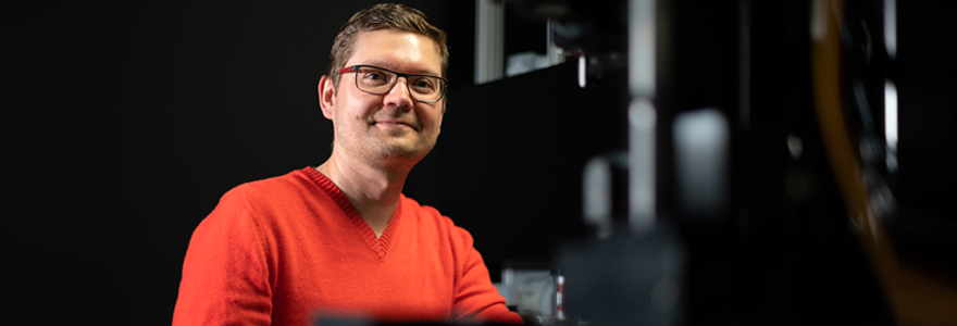 Andrew Pruszynski, PhD, in his lab